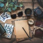 Travel Gadgets - photo of assorted items on wooden table