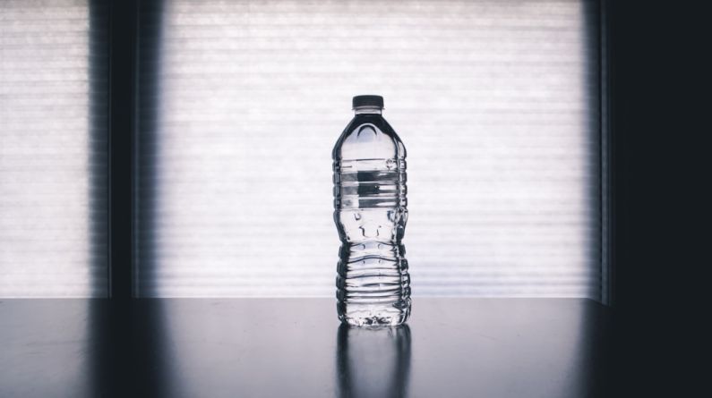 Water Bottle - clear drinking bottle filled with water