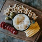 Flight Snacks - sliced cheese beside nuts