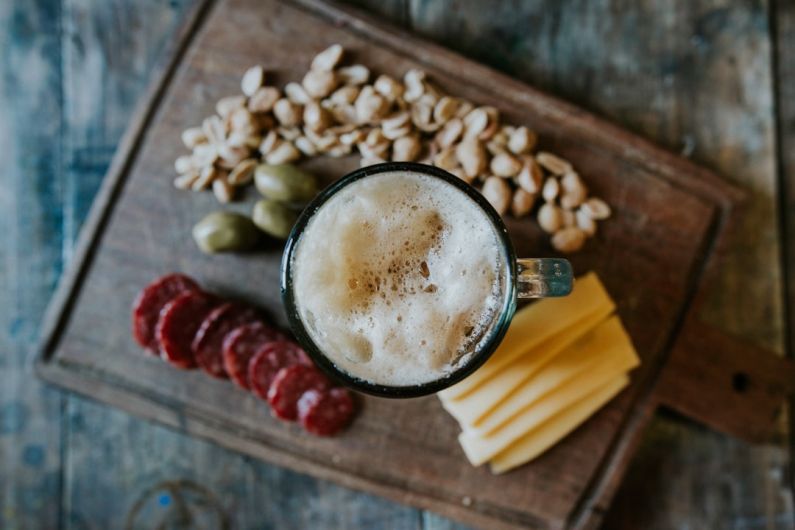 Flight Snacks - sliced cheese beside nuts