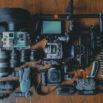 Photography Gear - flat lay photography of cameras and camera gear