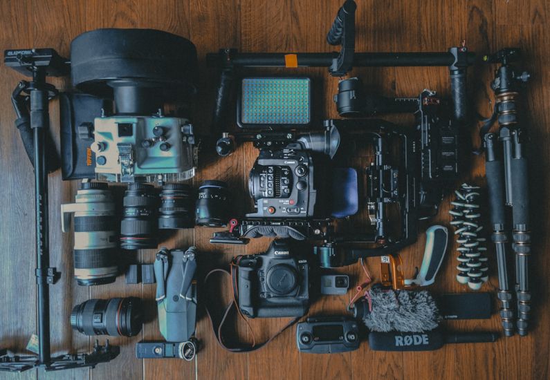 Photography Gear - flat lay photography of cameras and camera gear