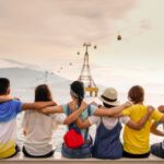 Making Friends - people holding shoulders sitting on wall