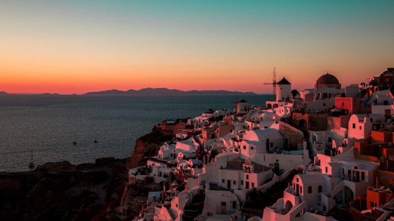 Santorini Sunset - aerial view of assorted-color houses