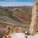 Self-discovery Travel - Person Standing among Arid, Barren Rocks