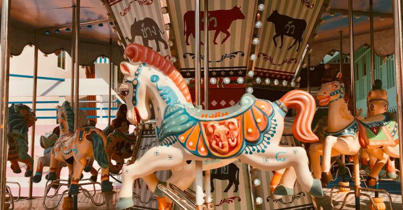 Theme Parks - White and Blue Horse Carousel