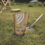 WiFi Search - brown wooden i love you print board on green grass during daytime