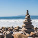 Work-life Balance - stack rock on seashore