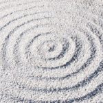 Zen Garden - a circular design made of sand on a beach