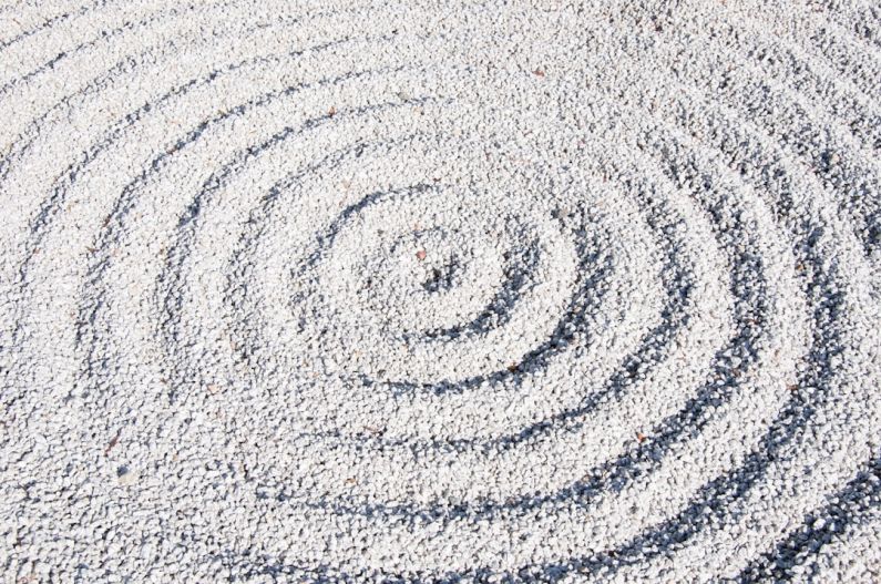 Zen Garden - a circular design made of sand on a beach