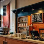French Bistro - flag of U.S. America hanging on white painted concrete wall
