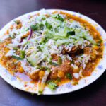 Street Food Stall - vegetable salad on white ceramic plate