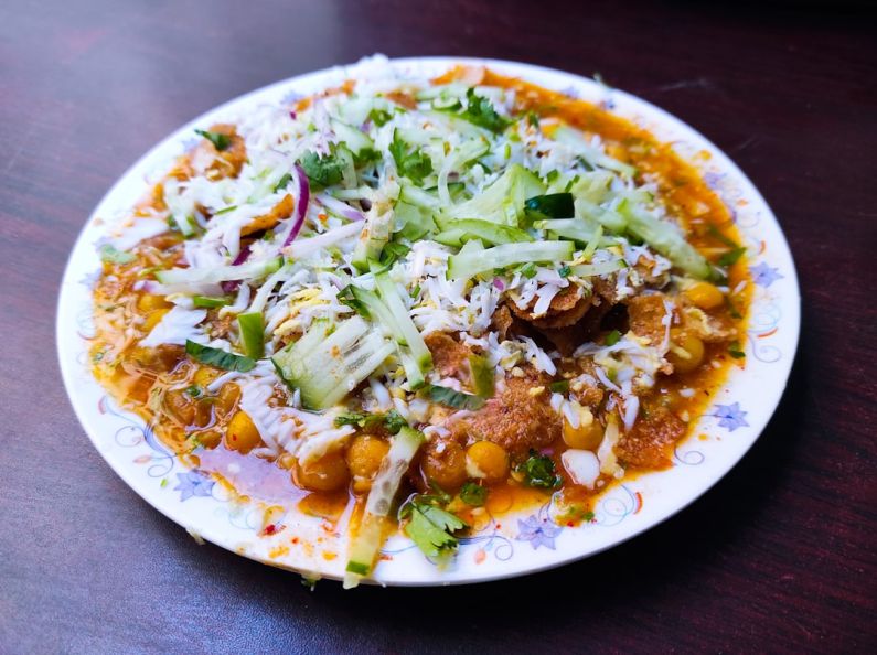 Street Food Stall - vegetable salad on white ceramic plate